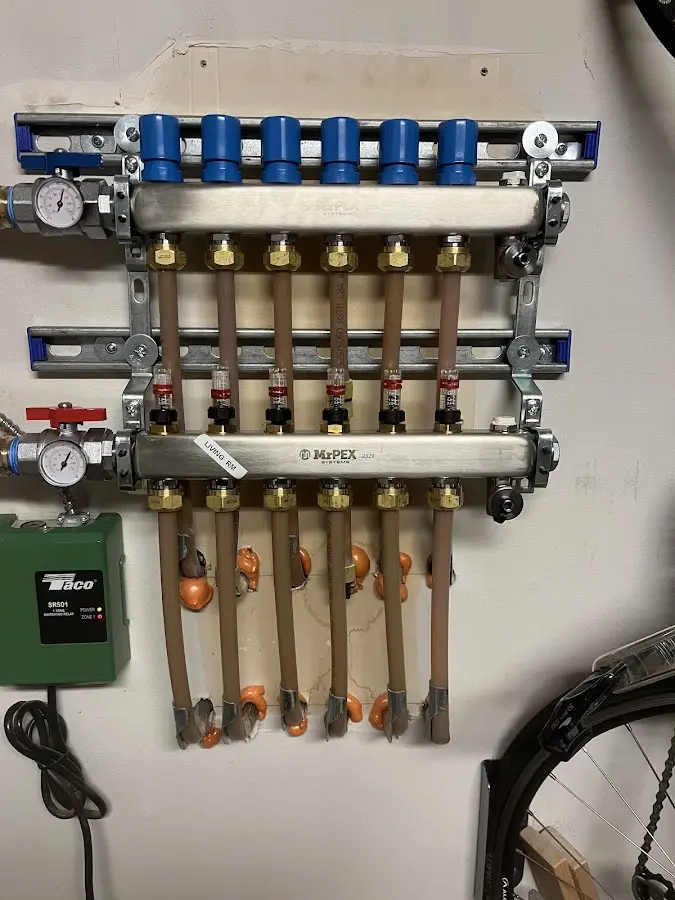 Plumber performing Water Heater Repair at a residential property in Lake